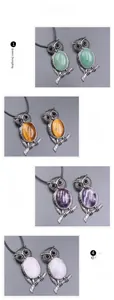 Detail of owl pendants in green aventurine, tiger eye, bluestone, and glaucophane