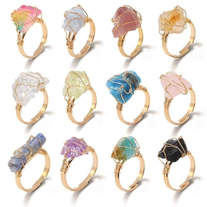 Handmade gold wire-wrapped raw crystal rings in twelve natural stone colors