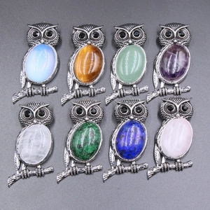 Set of eight vintage owl pendants with various natural stones and aged silver finish