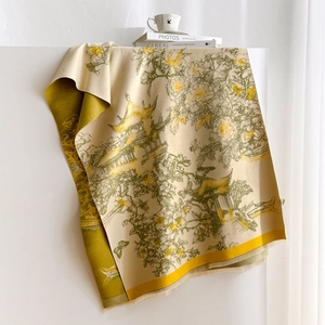 Detailed texture of thick cashmere-like scarf with Chinese garden embroidery and soft tassels