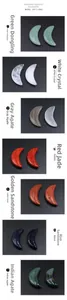 Detailed collection of 37mm crescent moon carvings in white crystal and gray agate