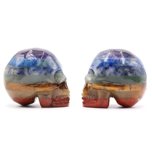 Set of two colorful layered natural stone skull figurines for Halloween home decoration