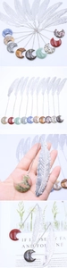 Detailed views of silver feather metal bookmarks with various crescent moon stone charms