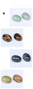 Detailed set of ladybug carved natural crystal beads in green aventurine and tiger's eye