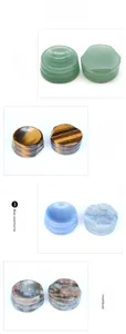 Detail showing four natural crystal sphere stands in Aventurine, Tiger Eye, and Blue Sodalite