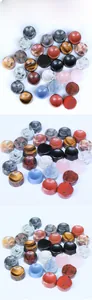 Detailed view of various natural crystal spheres on round stone display bases and stands
