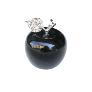 Polished black crystal apple ornament with silver sparkling rhinestone leaf detail