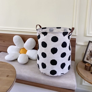 Nordic style foldable laundry basket with black polka dots and leather handles