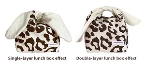 Canvas leopard print lunch bag with rabbit ear handles showing single and double layer capacity