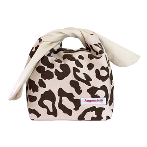 Japanese-style leopard print canvas tote bag with beige knot handles and metal snap button