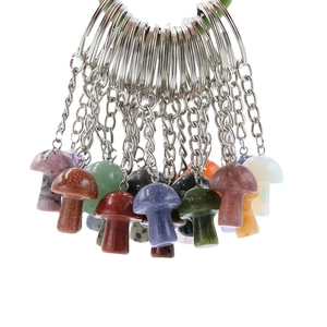 Natural crystal and gemstone mushroom keychains in various colorful semi-precious stones