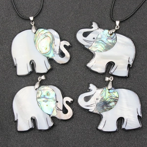 Pendentif éléphant en nacre blanche avec accents d'abalone et cordon noir tressé