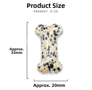 Detailed size view of bone shaped natural crystal stone with 35mm length measurements
