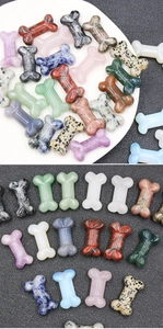 Macro detail of various natural gemstone bone carvings like amethyst and agate