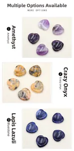 Detailed view of polished heart-shaped Amethyst, Crazy Onyx and Bluestone massage stones
