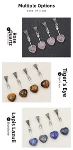 Detailed view of heart-shaped natural stone pendants with vintage cupid arrow accents