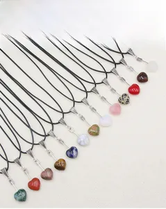 Detailed set of 12 natural crystal heart pendants with Cupid's arrow and black wax cords