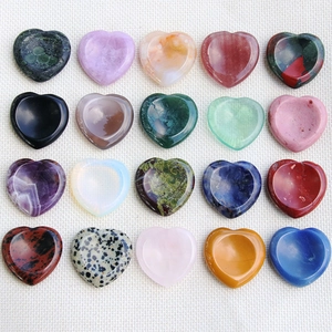 Set of twenty 30mm assorted natural heart-shaped crystal worry stones in grid layout