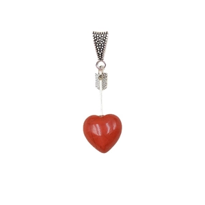 Natural red agate heart pendant with vintage silver cupid arrow on white background