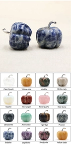 Selection of 30mm gemstone pumpkins including rose quartz and tiger eye for autumn decor