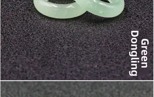 Macro view of polished green aventurine gemstone ring with smooth natural texture