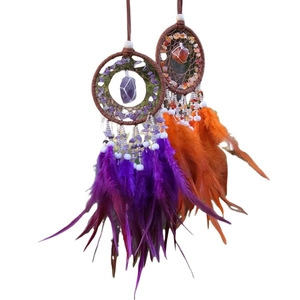 Handmade dreamcatcher set with natural amethyst, agate, and feathers in boho style