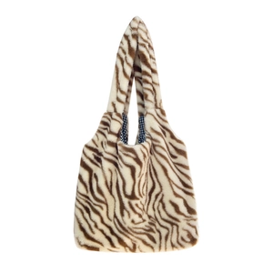 Large plush zebra print tote bag with soft faux fur texture and blue gingham lining