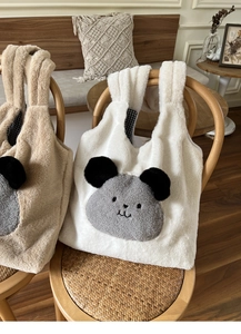 Detailed plush tote bag showing soft faux rabbit fur texture and cute animal pattern