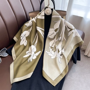 Olive green silk scarf with white orchid floral print for a classic retro aesthetic