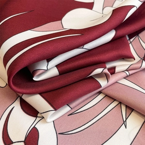 Burgundy and pink 90cm square silk scarf with abstract floral pattern and twill texture