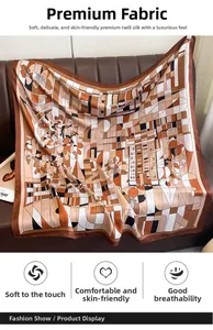 Detail of geometric floral silk scarf with warm tones on a premium leather surface