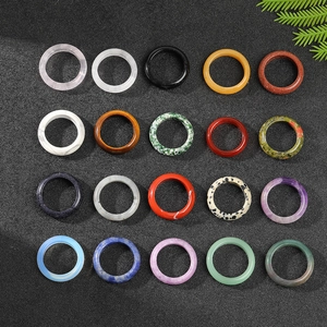 20-piece set of natural gemstone rings including rose quartz and amethyst displayed flat