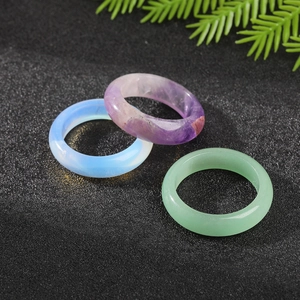 Polished natural crystal agate rings set in purple, light blue and pale green stones