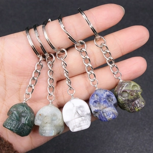 Set of 5 natural crystal skull keychains in various carved gemstones for Halloween gifts