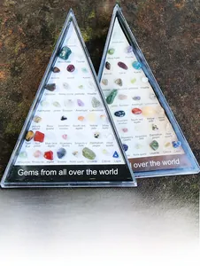 Detailed top view of 36 natural crystal specimens in a triangular display box
