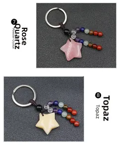 Detail of star-shaped crystal keychains in powder crystal and topaz with colorful beads
