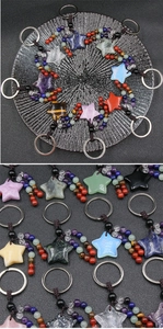 Detailed view of colorful star-shaped natural gemstone keychains with woven rope