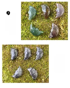 Macro view of hand-carved moon face healing stones in ocean jasper and grey agate
