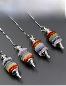 Detailed view of four multi-layer 7 chakra natural stone dowsing pendulums with metal chains