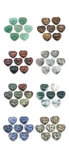 Macro shot of 20mm heart-shaped natural crystal and agate stones in eight various textures