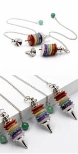 Macro detail of detachable seven chakra healing stone pendulum with silver metal chain