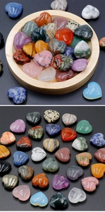 Macro detail of various 30mm heart-shaped polished natural crystal and agate stones