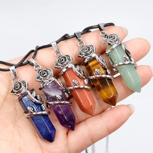 Set of five natural hexagonal crystal point necklaces with silver rose metal wrapping