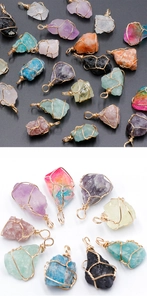 Macro view of assorted raw natural crystal pendants with handmade gold wire wrapping