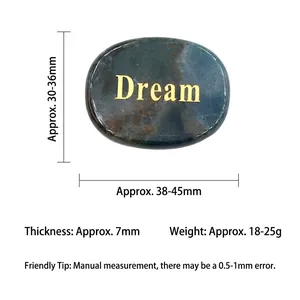 Polished natural agate stone engraved with golden Dream text and specific size details