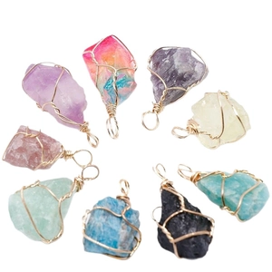 Handmade gold wire wrapped natural crystal pendants in various colors for jewelry making