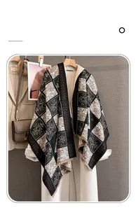 Close-up of vintage check pattern on imitation cashmere scarf with tassel fringe