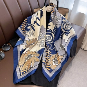 French vintage floral silk square scarf in navy and cream styled on a black outfit