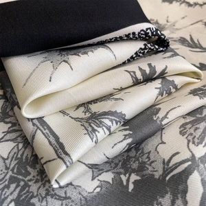 Macro detail of retro plant pattern fabric with premium diagonal twill texture and sheen