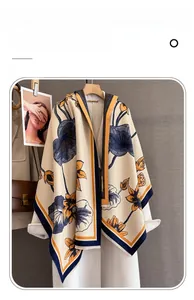 Detail of imitation cashmere scarf featuring lotus patterns and soft tassel edges